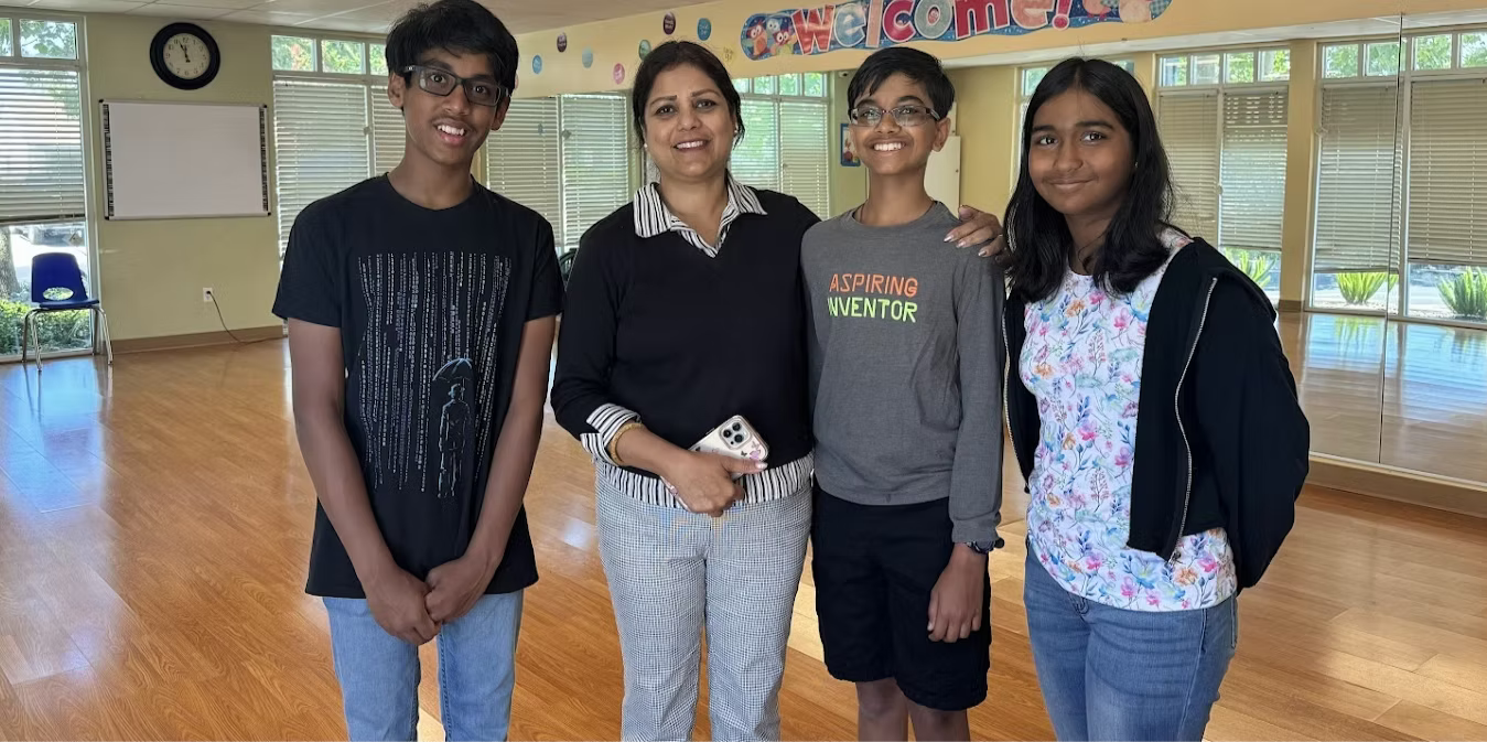 StepSTEM team with teacher
